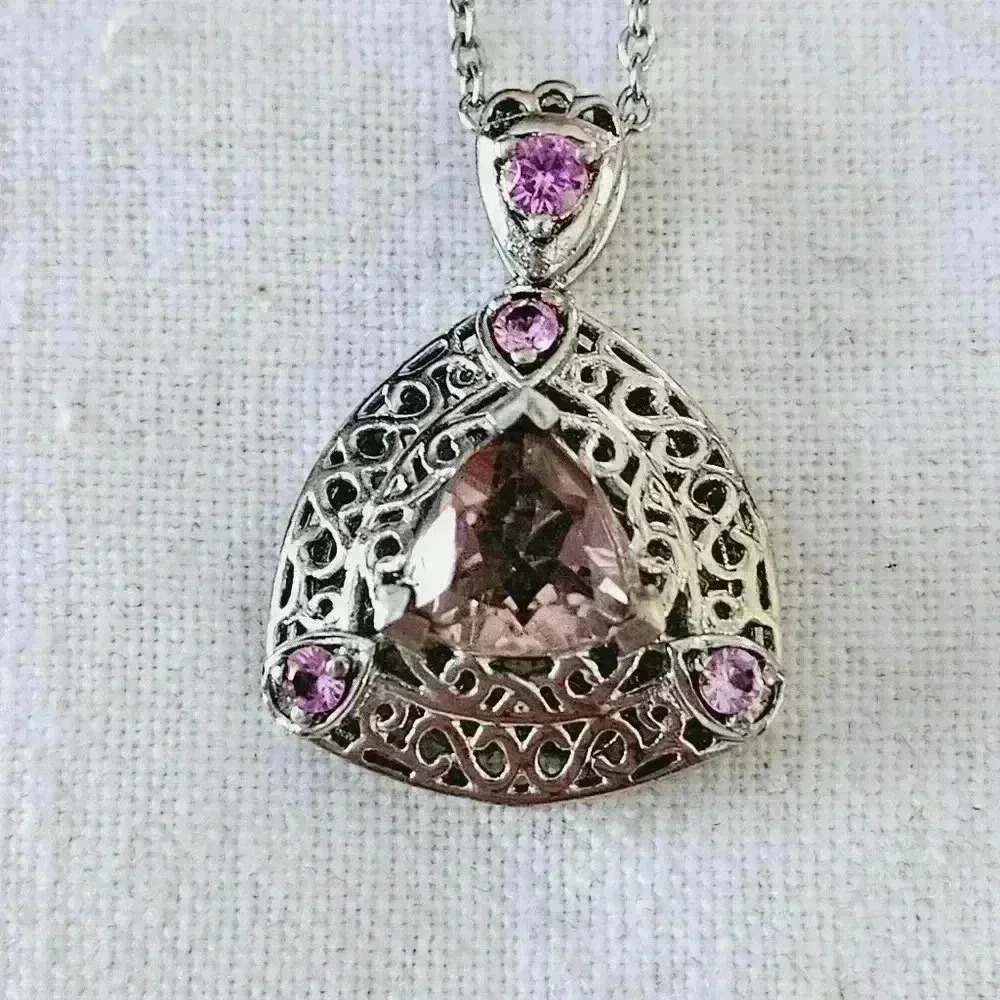 Pink Crystal  Pendant Necklace. Pink crystal in the center of Filigree setting. 